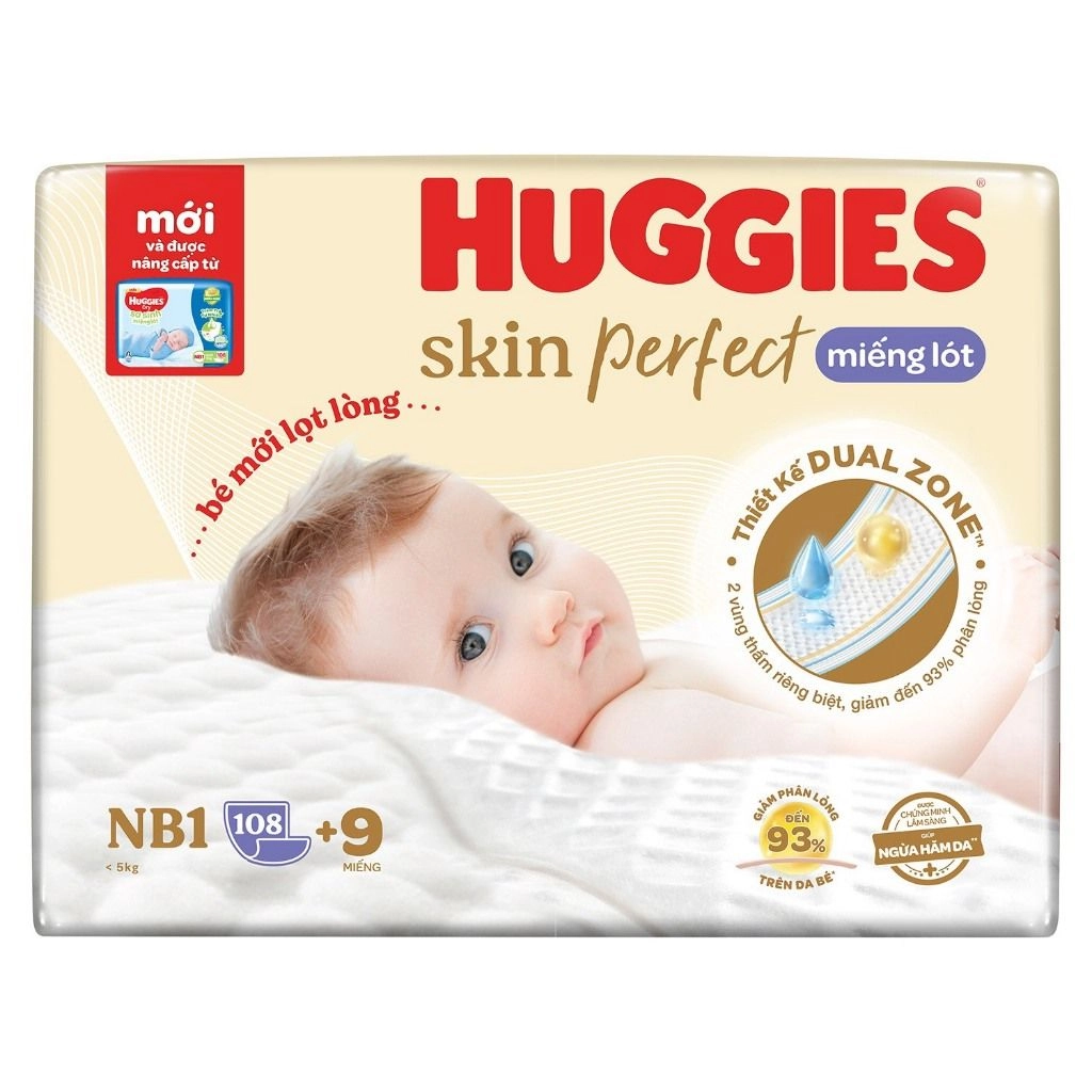 Miếng lót sơ sinh Huggies Skin Perfect NB1 64+4 miếng với 2 vùng thấm giảm kích ứng da
